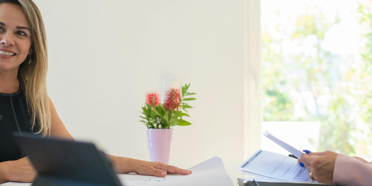 A client consulting with a property advisor, receiving personalized, data-backed guidance.