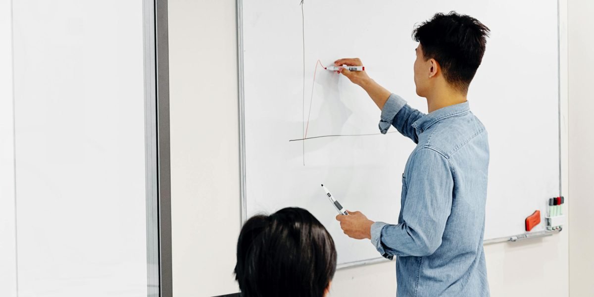 A person strategizing their real estate portfolio, considering diversification and long-term goals.