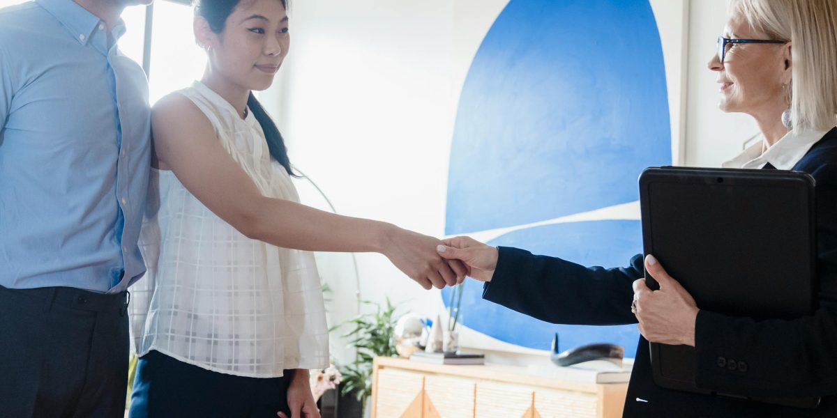 A real estate consultant actively engaging with a client, demonstrating trust and personalized service in the investment process.