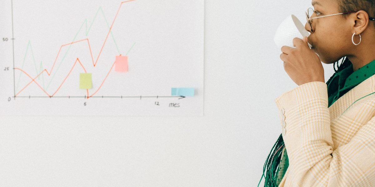 A person deep in thought, representing the careful consideration required when making significant property investment decisions.