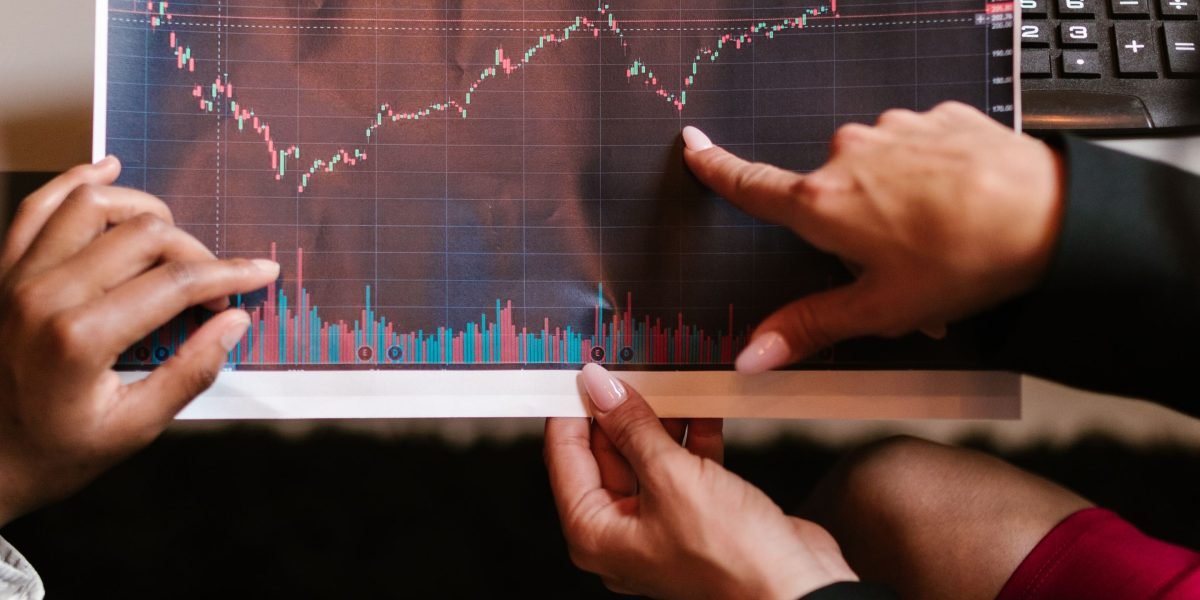 A team of professionals collaborating and analyzing market data to make informed investment decisions.
