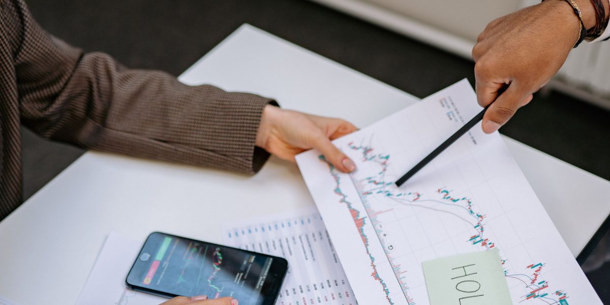 An investor thoughtfully reviewing documents, making informed choices about property in Dubai.