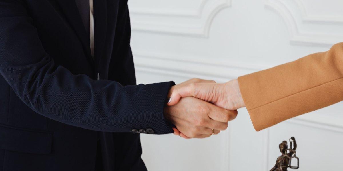 Professionals sealing a successful agreement, symbolizing trust and collaboration.