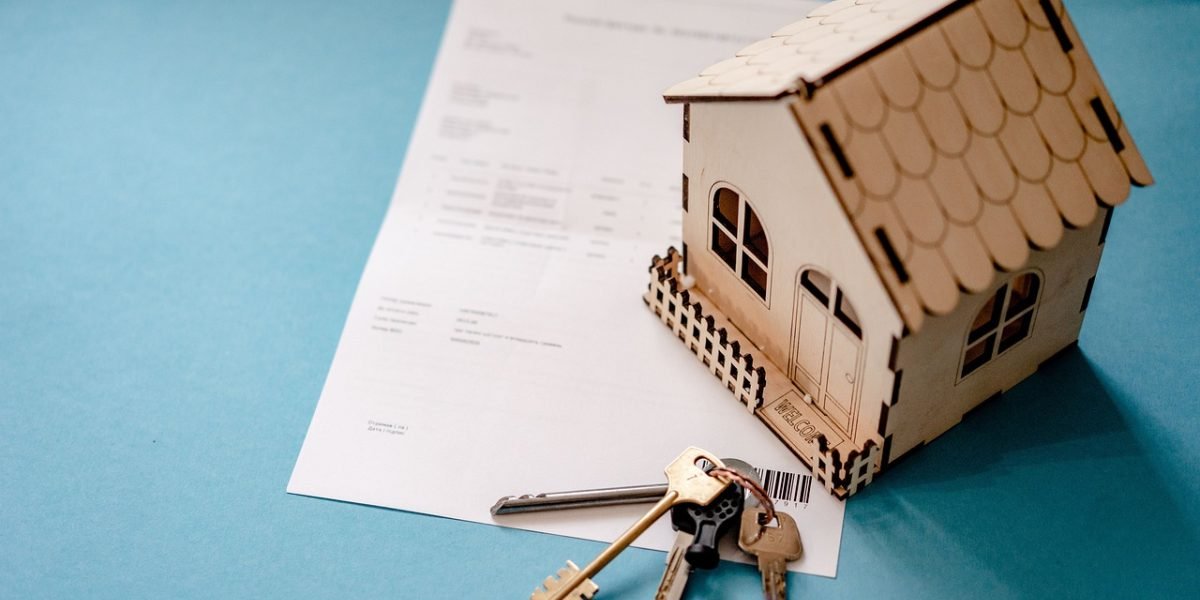 A couple engaged in a serious discussion about property investment, possibly with a legal advisor or agent, reviewing details.